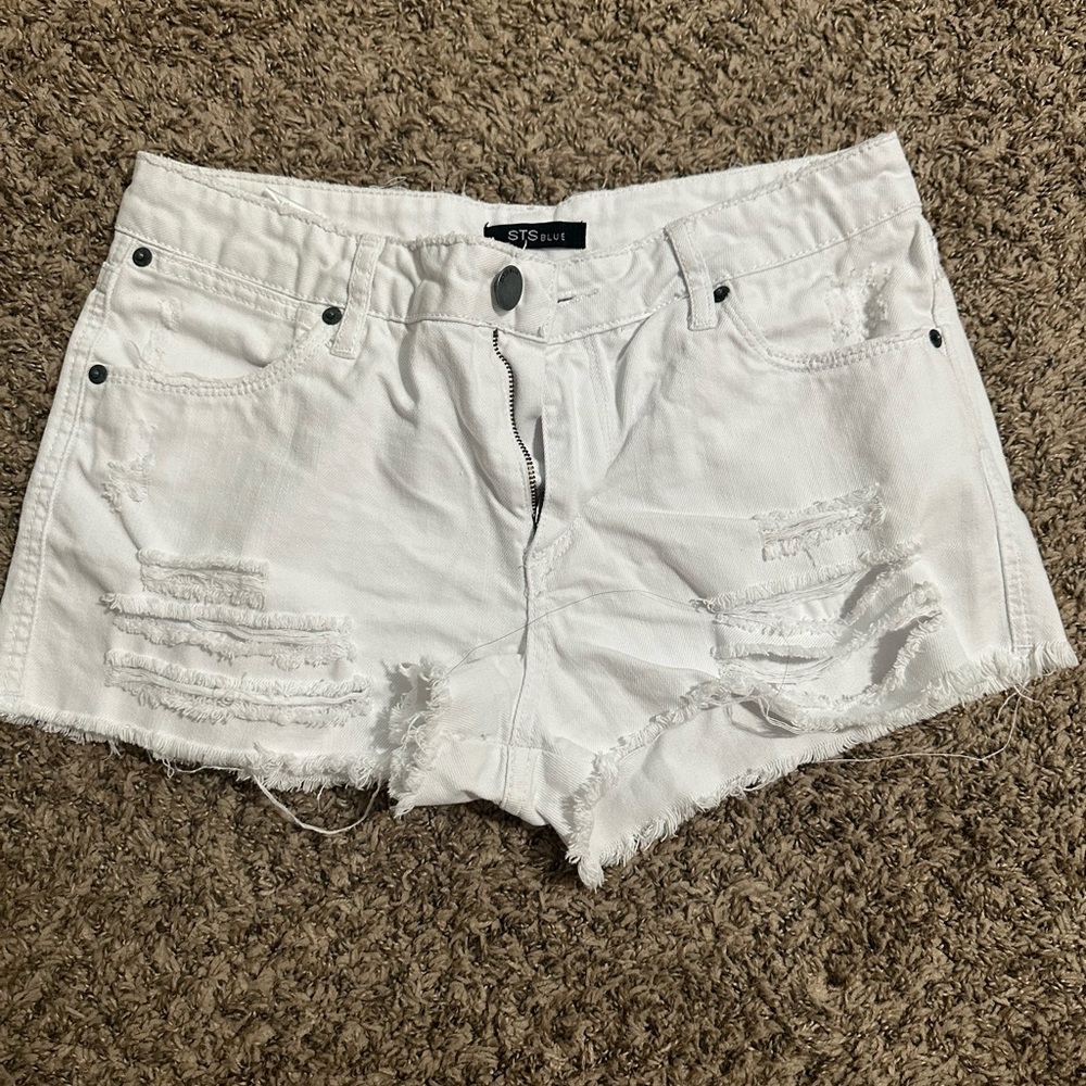 White distressed jean shorts